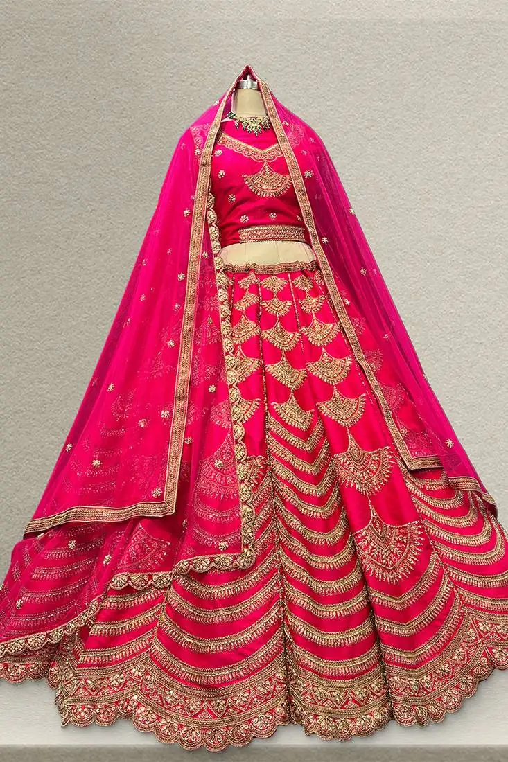 Rani pink raw silk bridal lehenga with unstitched blouse