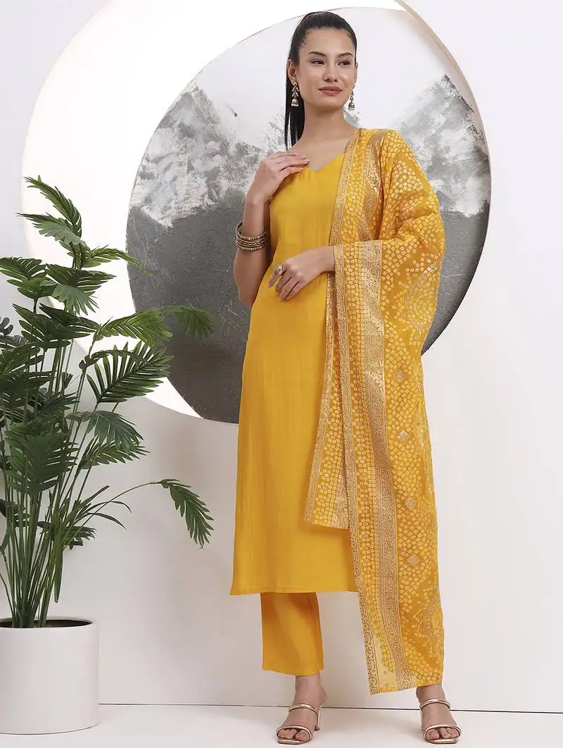 Yellow solid straight silk blend sleeveless kurta trouser dupatta set