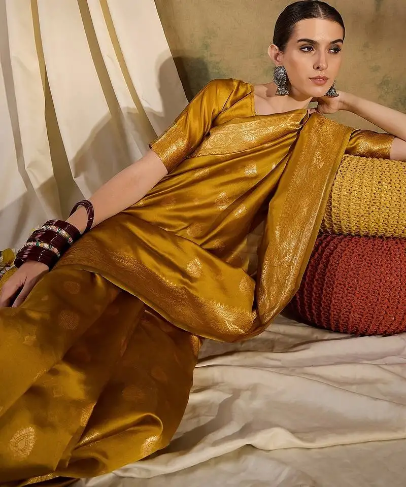 Vibrant mustard banarasi silk saree with weaving work