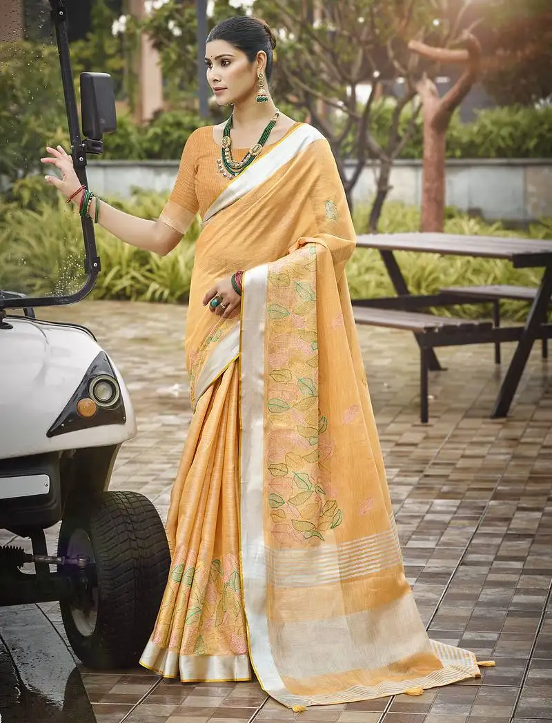 Sangam prints light orange silk woven work traditional saree