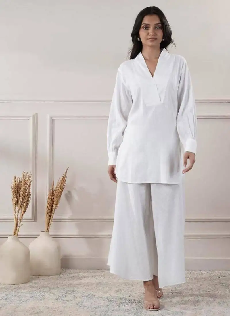 Women white cotton top with flared pants