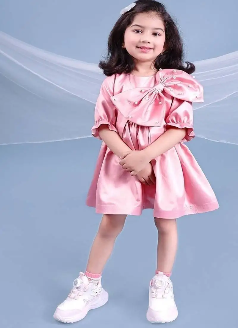 Pink embroidered satin dress paired with jacket