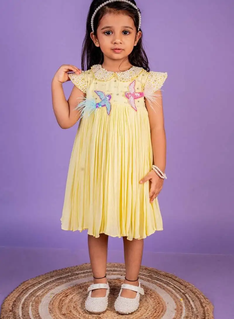 Yellow embroidered cotton dress