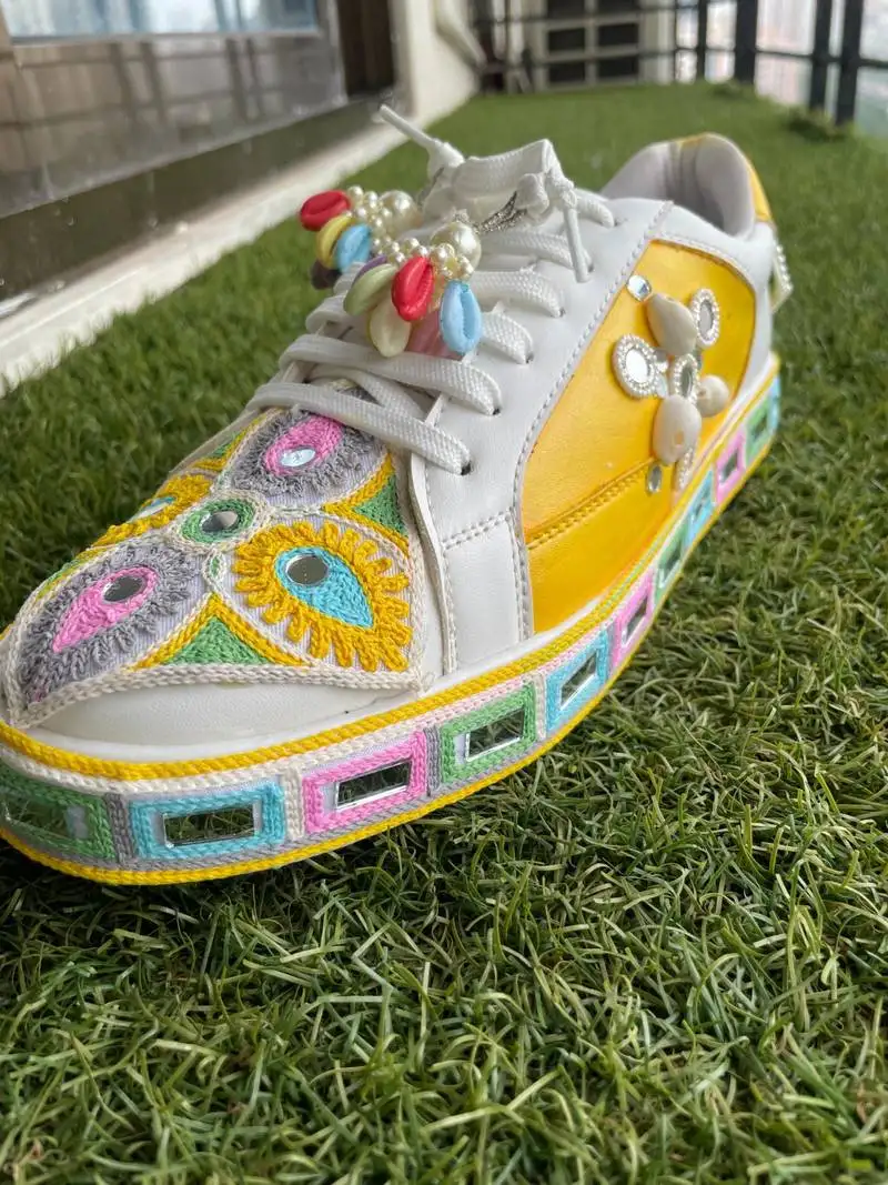 Yellow mirror embroidered leather sneaker