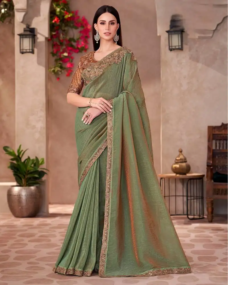 Green golden shine georgette saree with linen work blouse