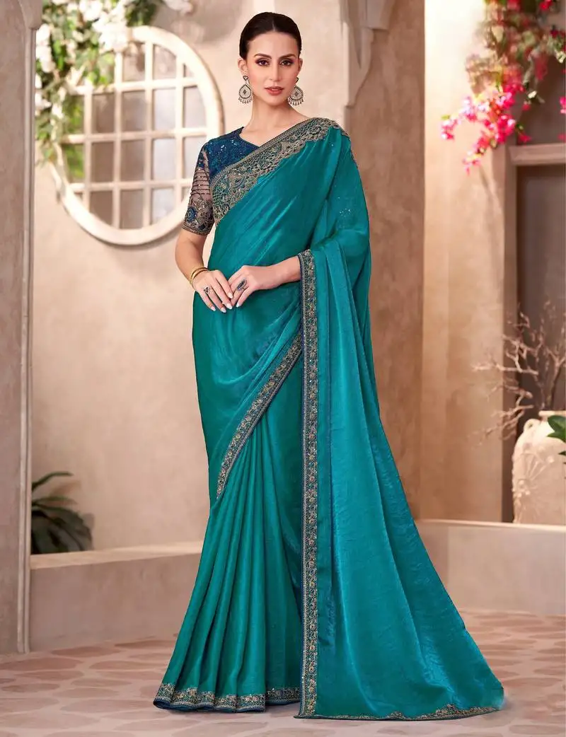 Peacock blue satin georgette saree with linen work blouse