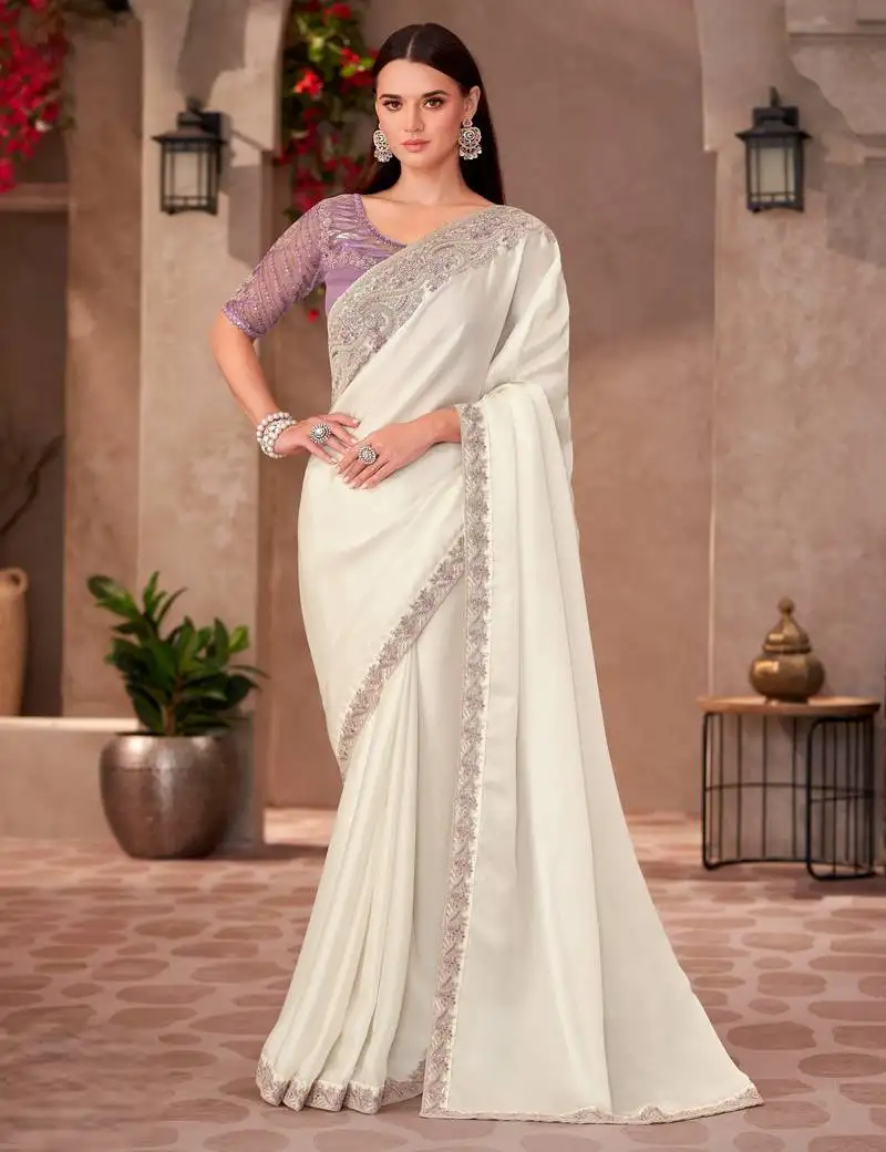 Pearl white shining georgette saree with linen work blouse