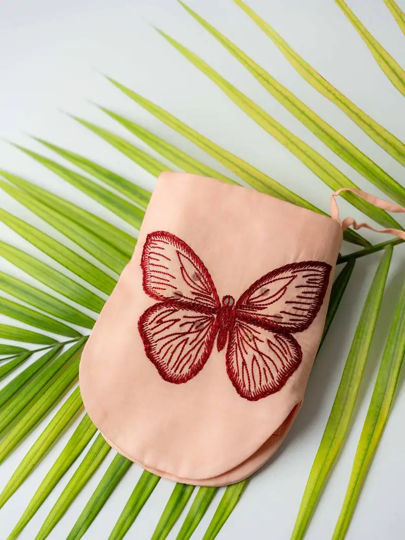 Float hand embroidered pouch
