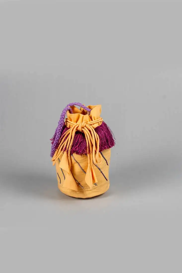 Claire hand embroidered potli