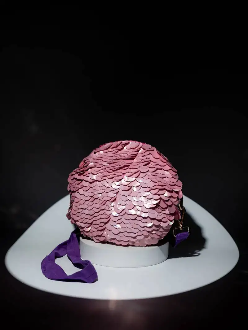 Aurora embroidered sling bag