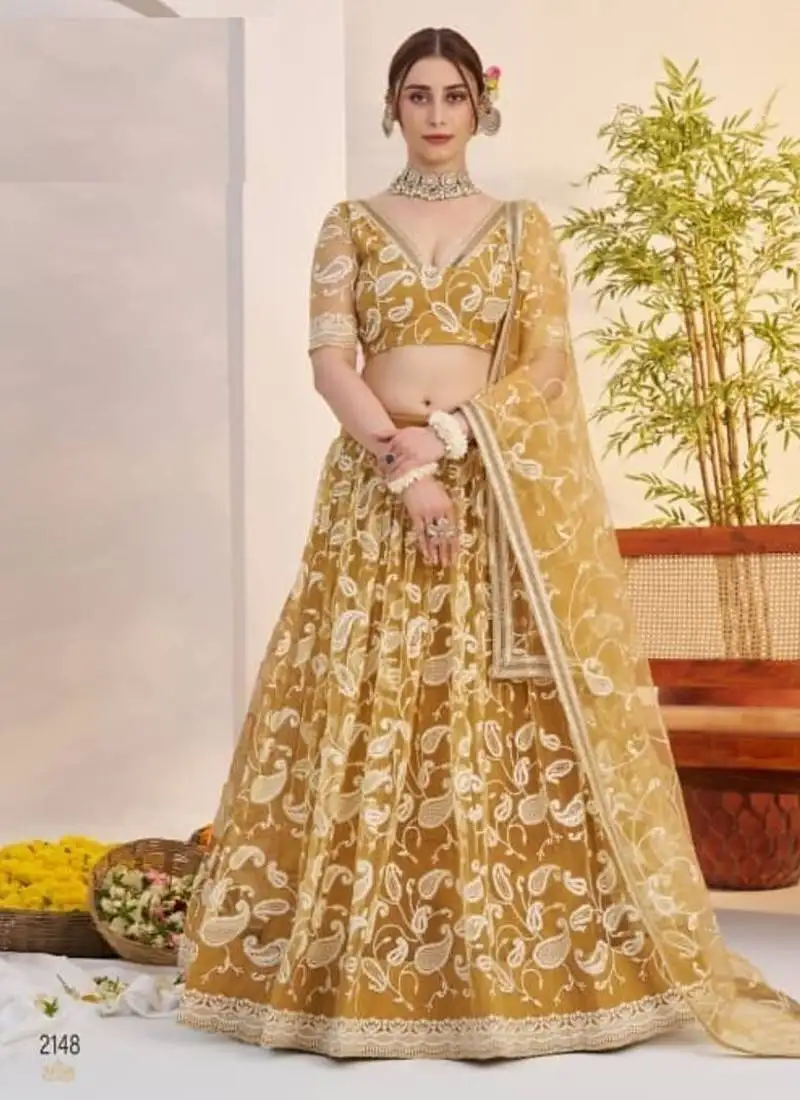 Mustard yellow heavy embroidery net semi stitch a line lehenga with blouse