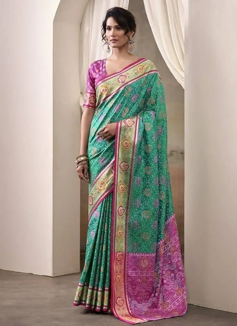 Green & pink patola silk blend festival wear saree