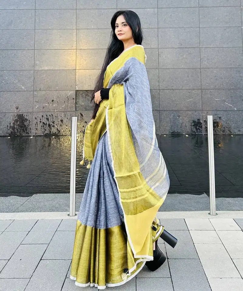 Grey handloom linen with gold zari border