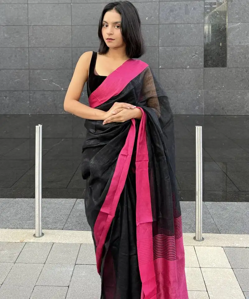 Black handwoven linen saree with contrast pink border