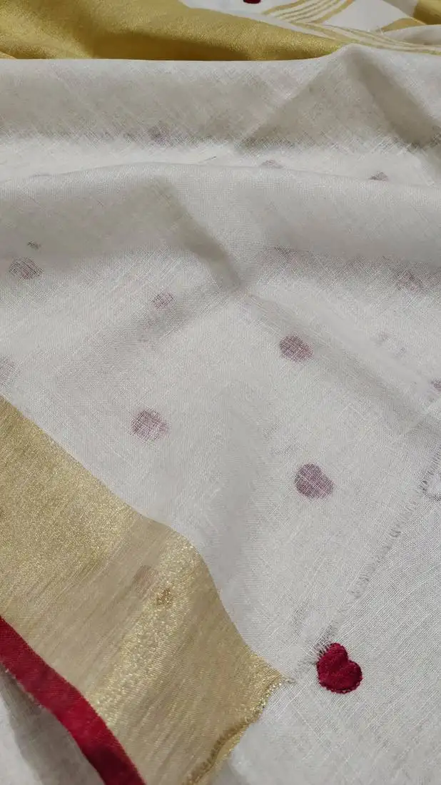 Handwoven white linen saree with heart embroidery work