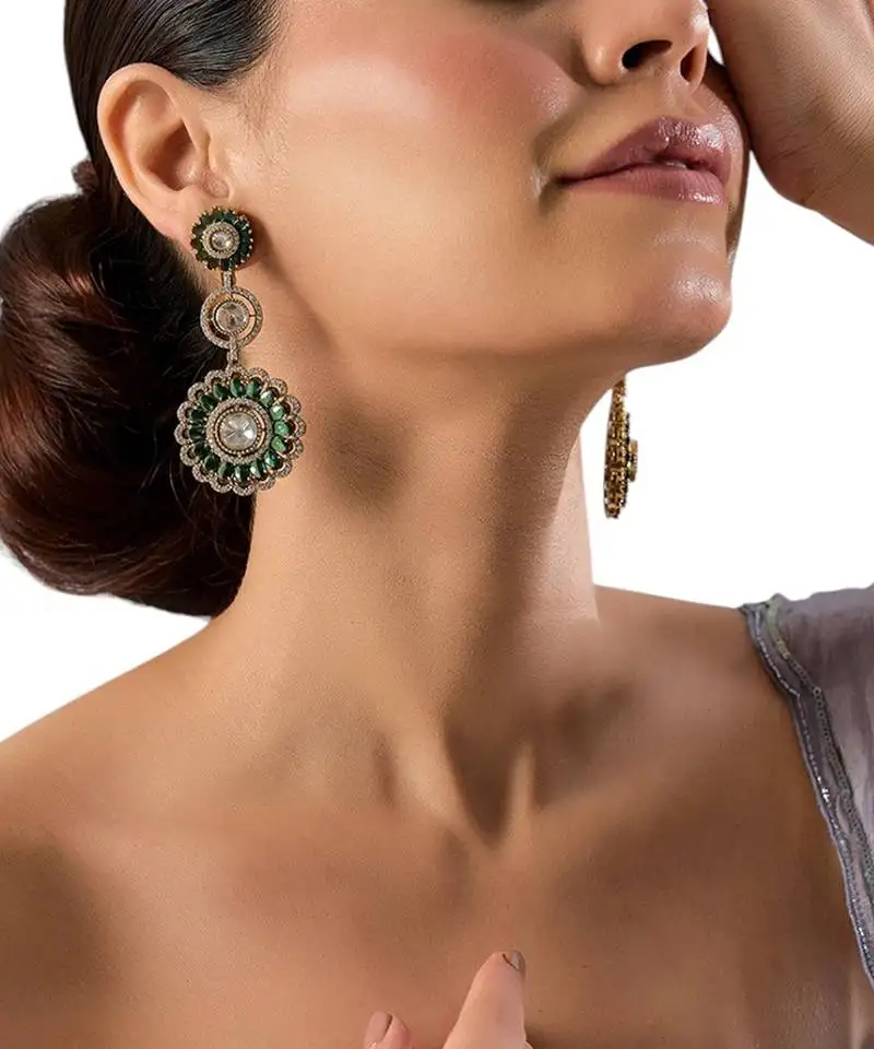 Gold plated green stone kundan dangler earrings