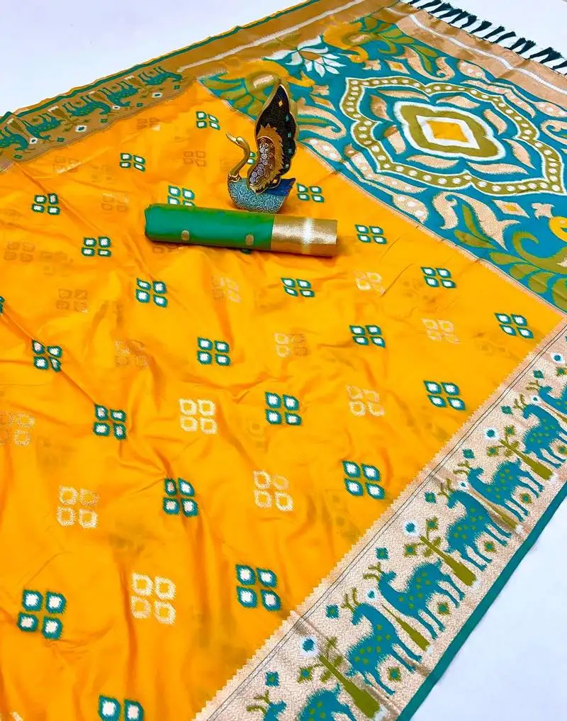 Yellow soft saree with zari weawing meenakari rich pallu and unique ikkat border