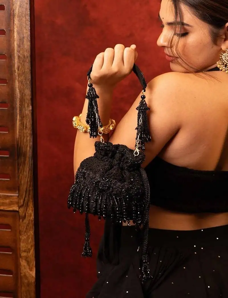 Black embroidered silk potli bag