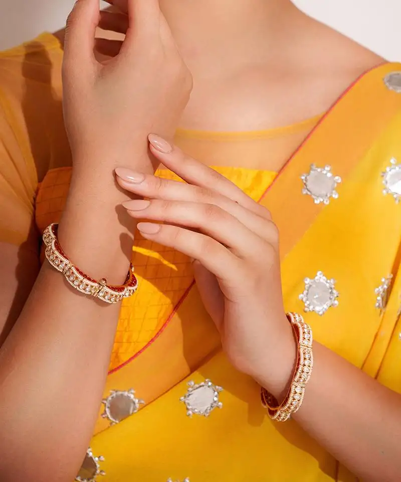 Gold plated red stone kundan bangles