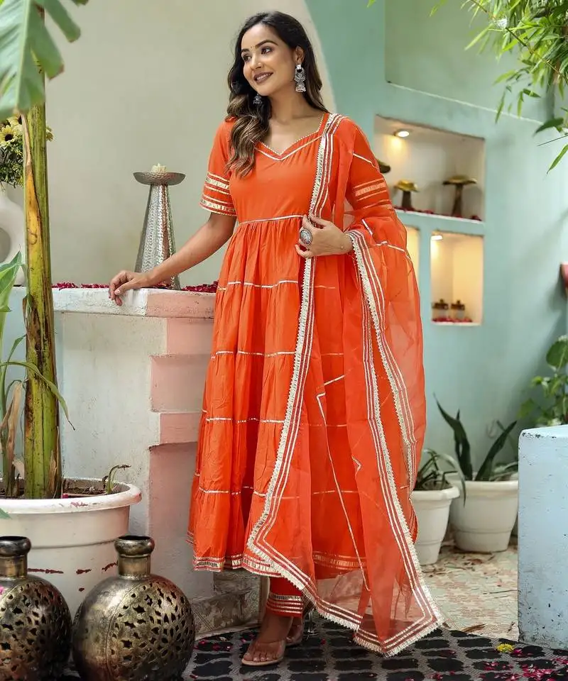 Orange cotton solid & gota patti work anarkali kurta bottom dupatta set