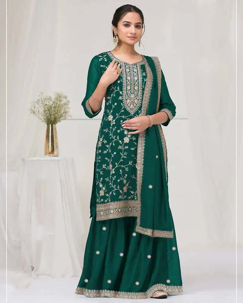 Dark green color embroideried faux chiffon semi stitched salwar suit