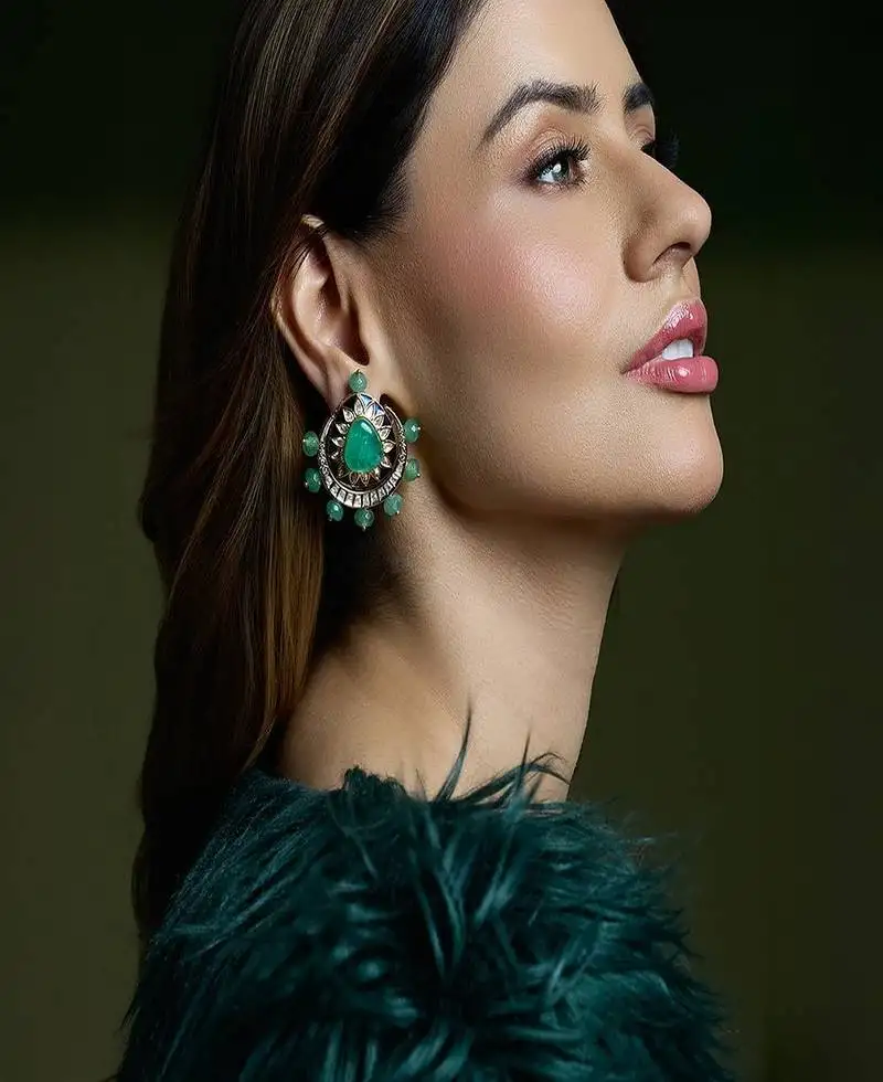 Gold plated kundan green stone earrings