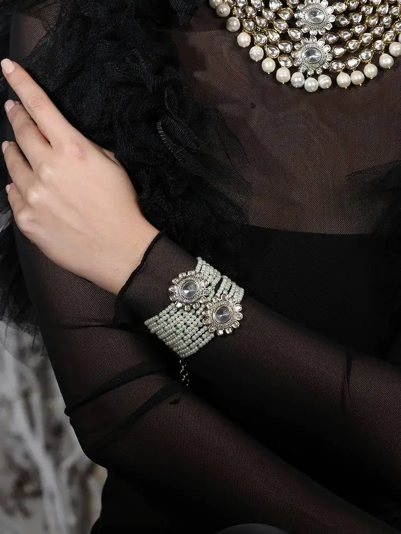 Gold plated kundan pearl bracelet