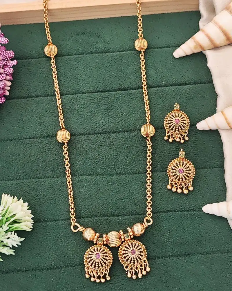 Antique gold-plated designer chain pendant set with earrings – red & green stone embellishments