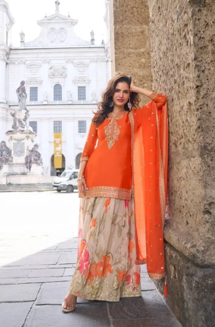 Orange party wear semi stitched gharara suits