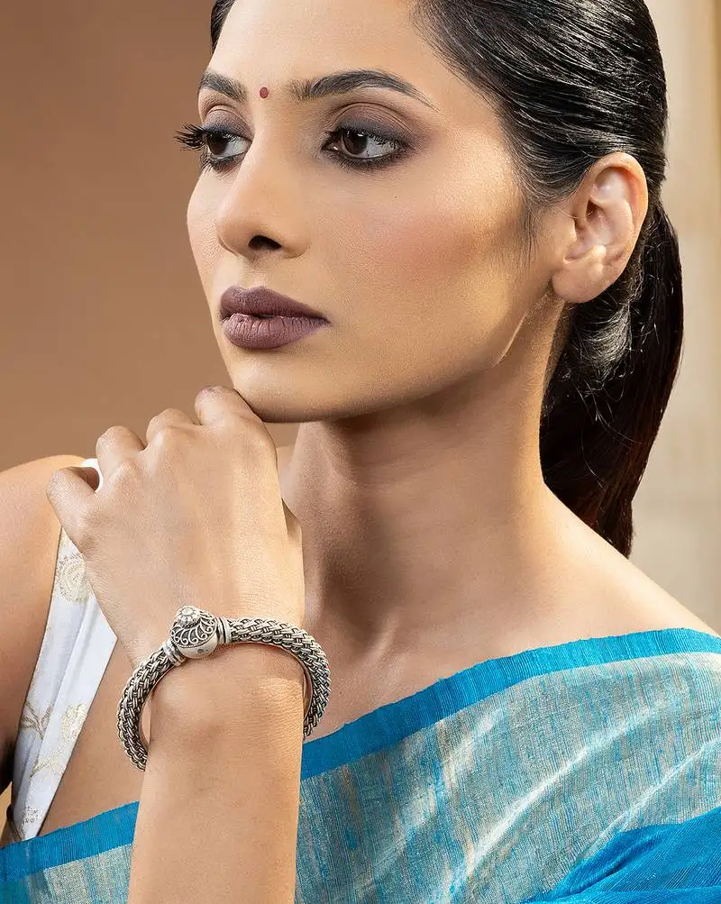 Ornamental woven silver kada