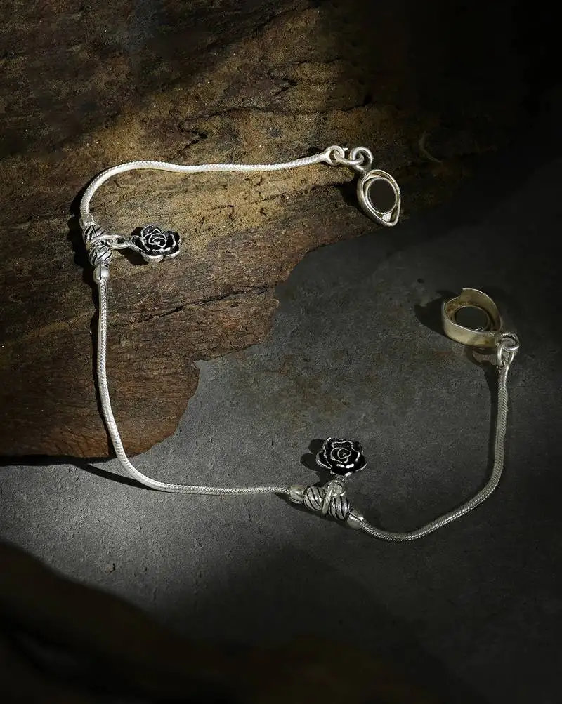 Silver floral charm anklet