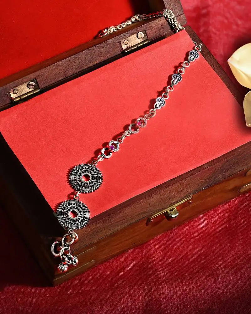 Silver circular motif anklet