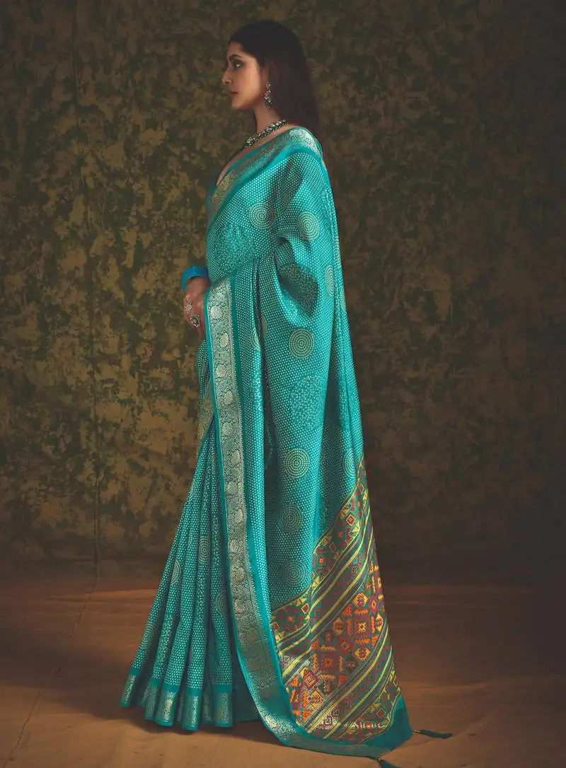 Sea green velvet tussar silk blend foilprint saree with unstitched blouse