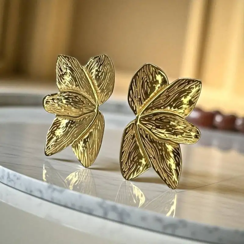 Golden glamour anti-tarnish textured leaf stud earrings – elegant minimal gold finish for everyday & festive wear