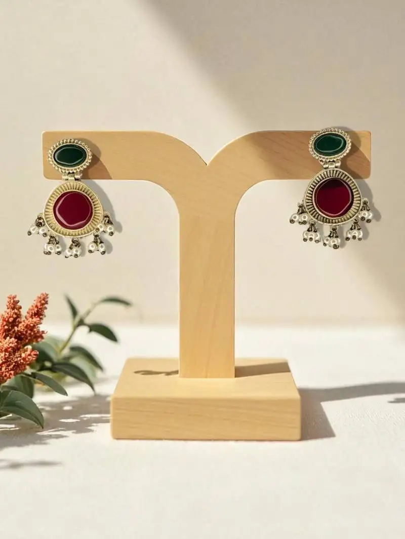 Golden glamour emerald drop antique earrings for women – traditional oxidized silver with green stone & pearl danglers