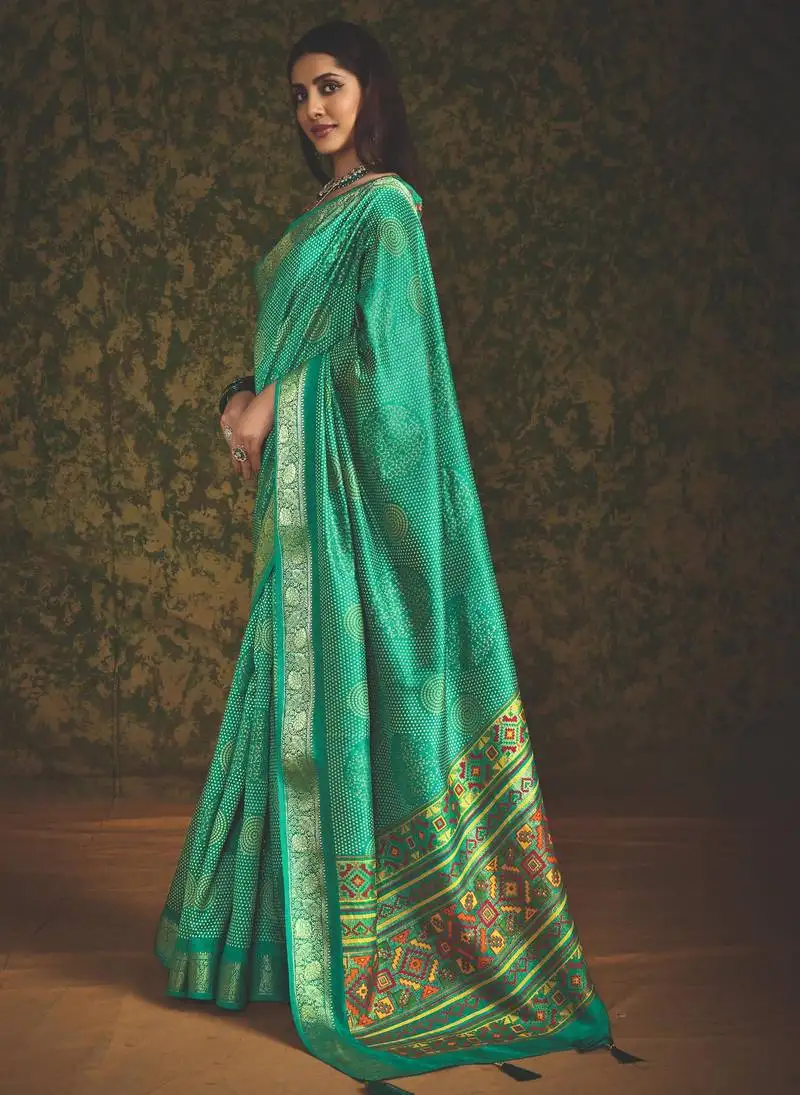 Bottle green velvet tussar silk blend foilprint saree with unstitched blouse