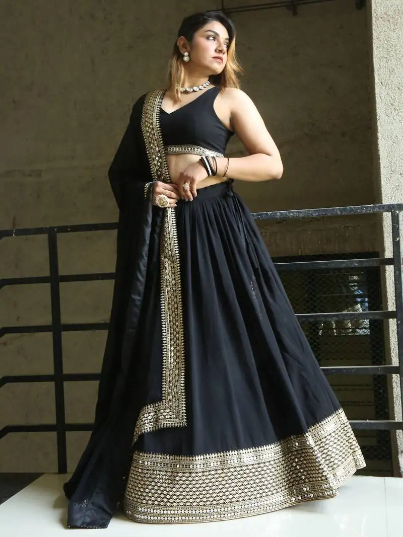 Pretty black heavy lace work georgette reception wear lehenga choli