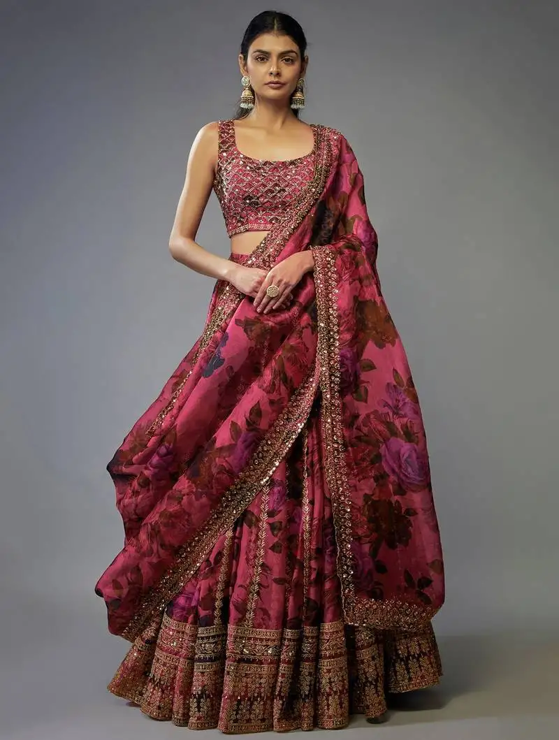 Gorgeous coral pink floral printed organza sangeet wear lehenga choli