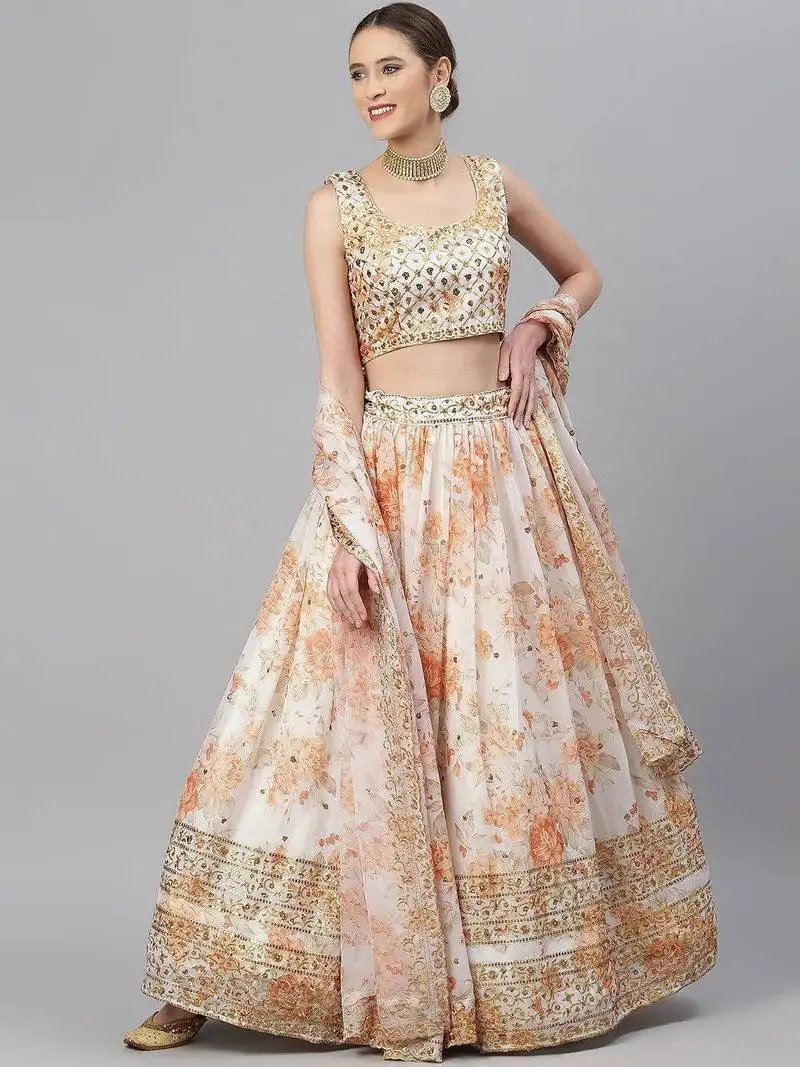 Off white & peach-coloured embellished sequinned indian wedding designer lehenga