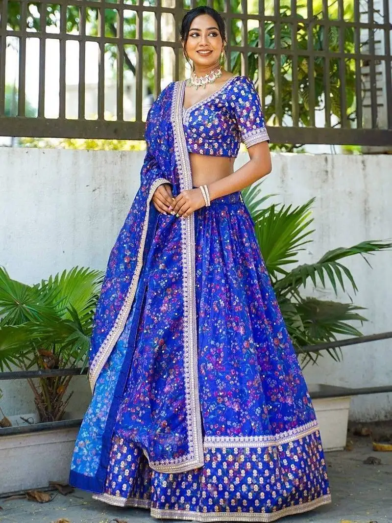 Attractive royal blue floral printed organza reception lehenga choli