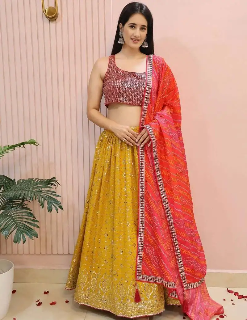 Majestic yellow embroidered traditional lehenga choli
