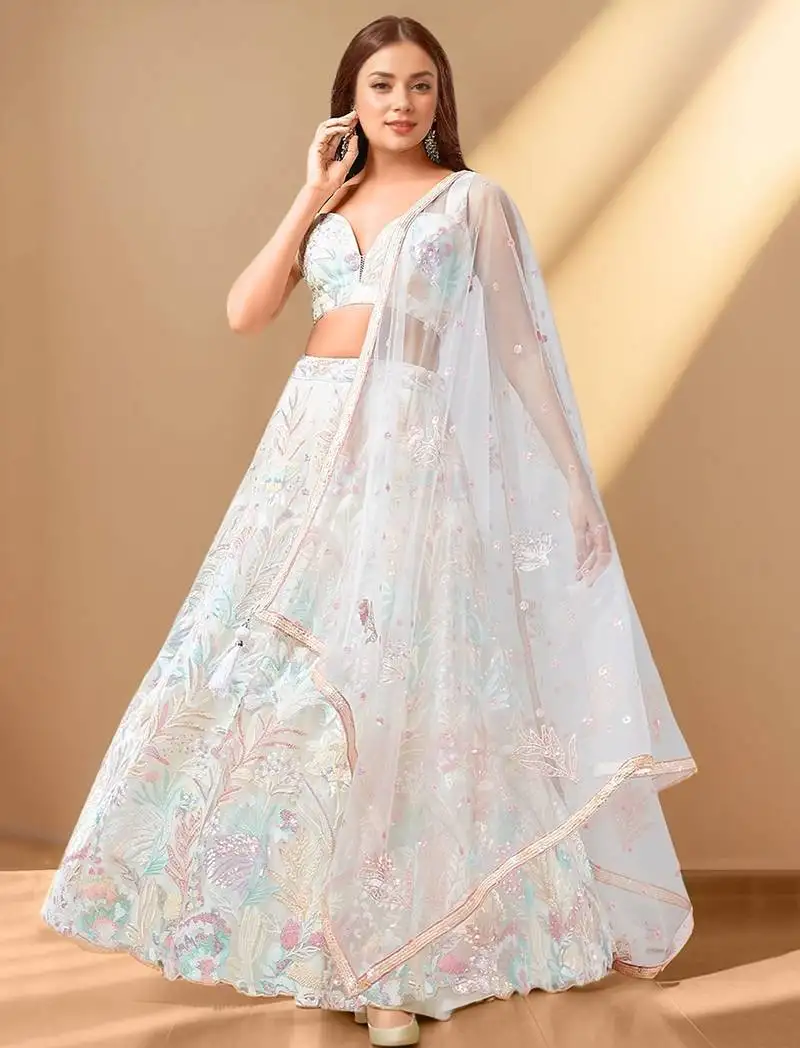 Wonderful off-white sequins net reception wear lehenga choli
