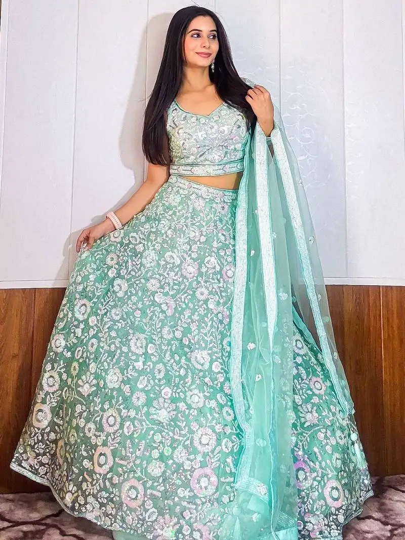 Fascinating blue sequins net reception wear lehenga choli with dupatta