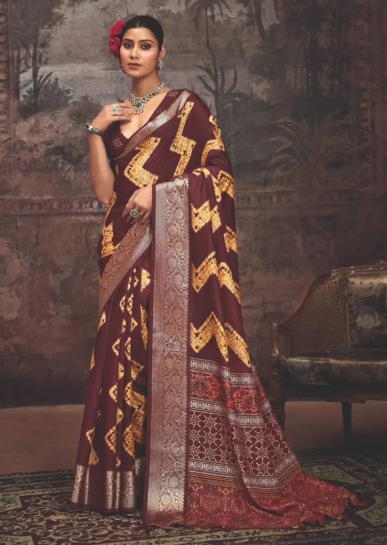 Maroon dolla silk blend self jaquard border saree with unstitched blouse