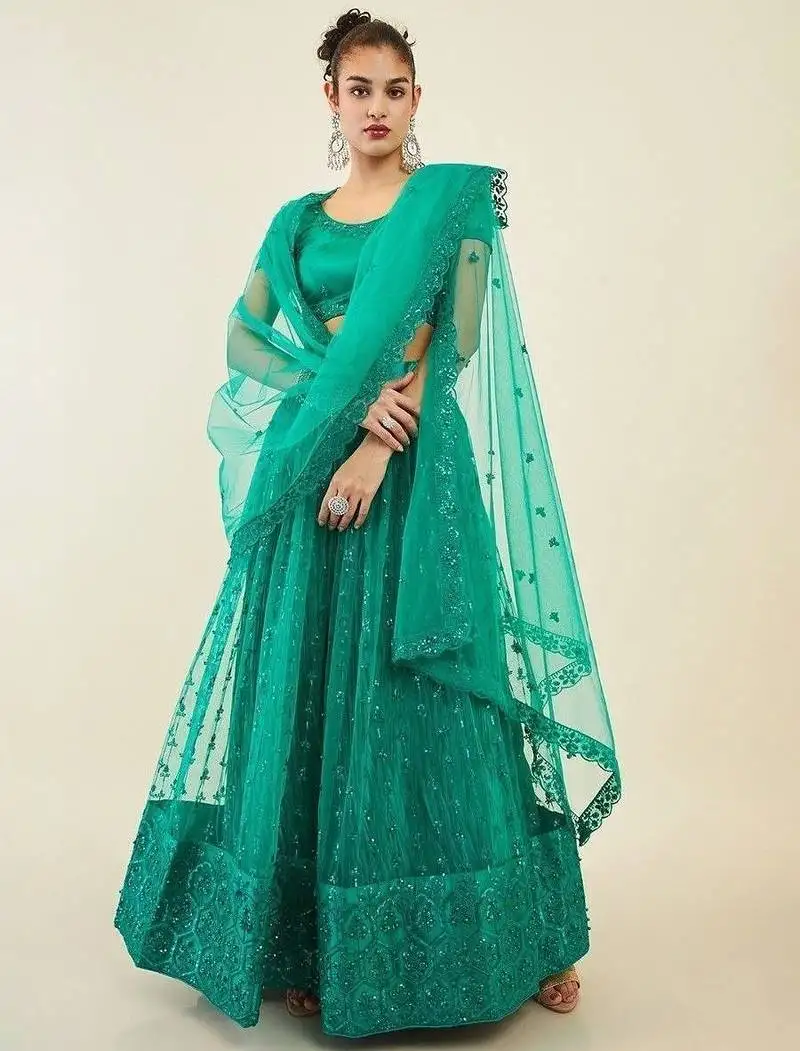 Dazzling teal green sequins net lehenga choli with dupatta