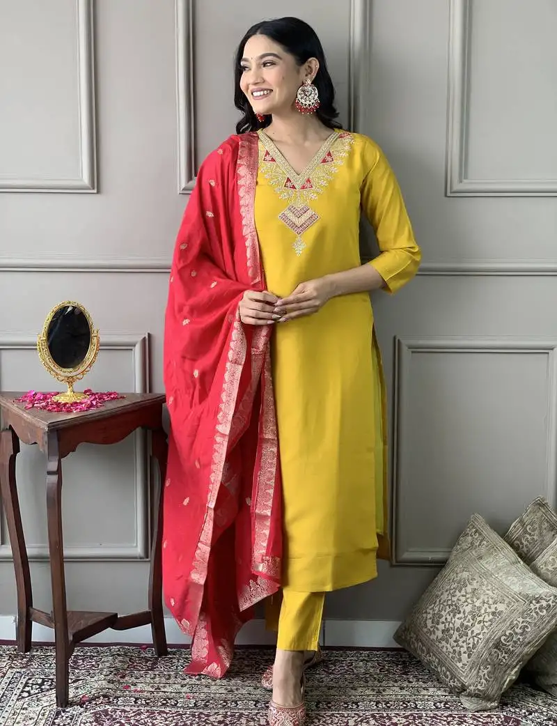 Yellow colored party wear embroidered stitched chanderi pant style kurti suit with duppatta