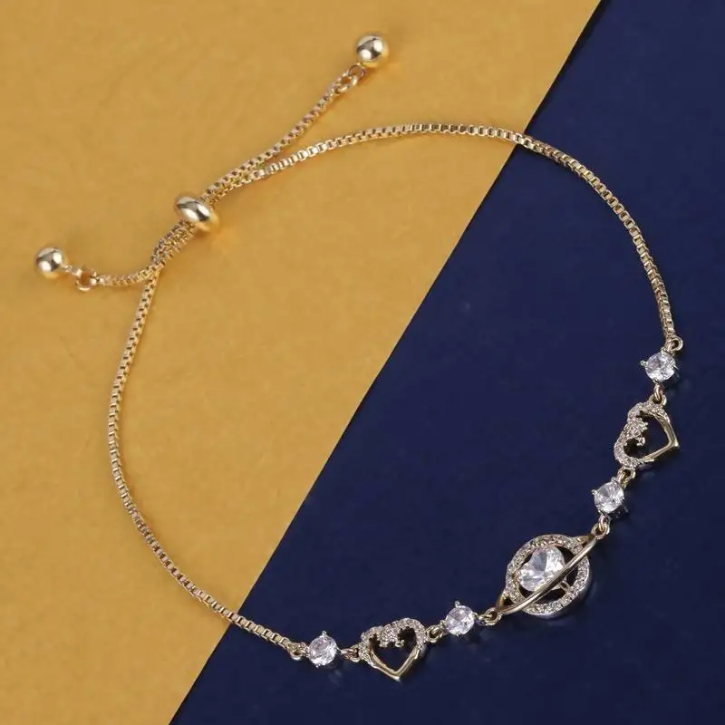 Lavish heart shape gold plated free size charm bracelet for women