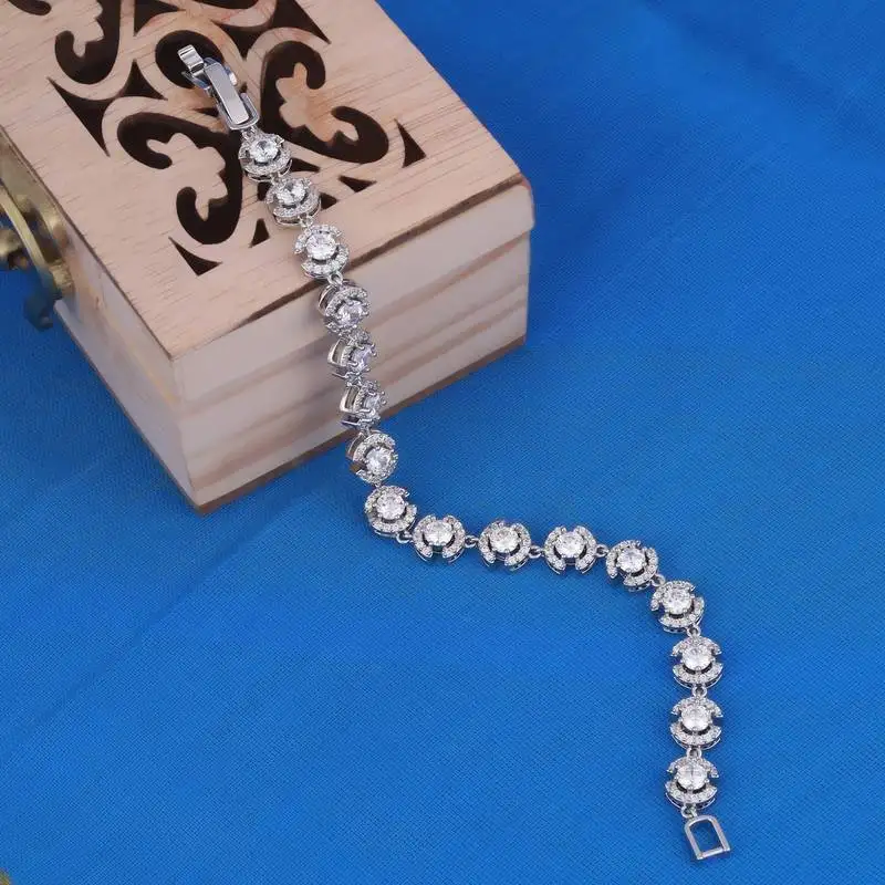 Modish round shape studded cz silver plated free size charm bracelet for women