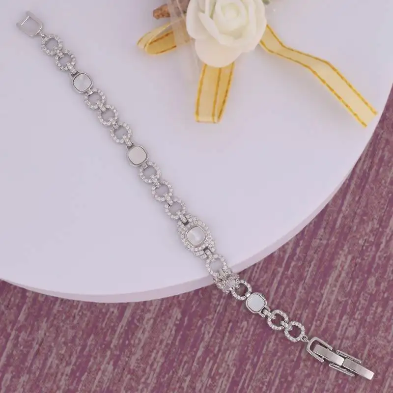 Exotic round shape silver plated free size charm bracelet for women