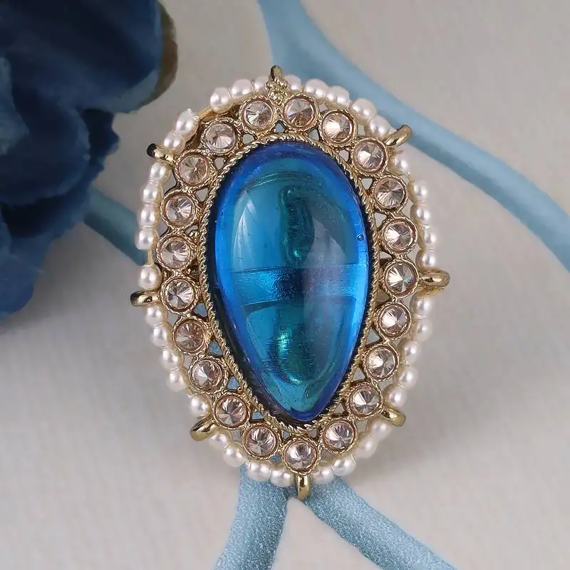 Splendid oval shape center blue stone gold plated adjustable finger ring for women